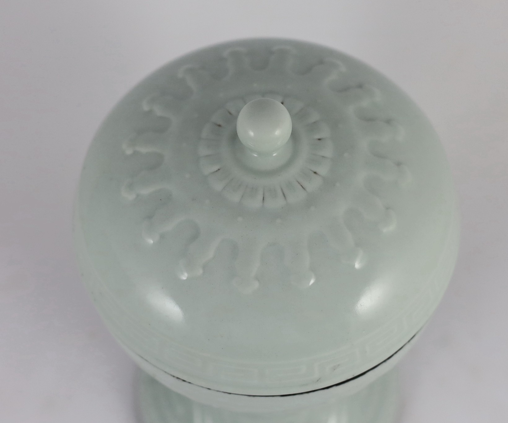 A Chinese white glazed vessel and cover, dou, Qing or later, 25cm high